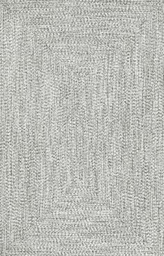 a gray rug with small white dots on the bottom and one line in the middle