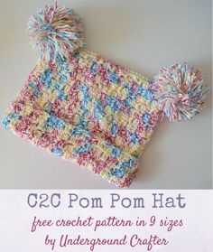 a crocheted hat with pom - poms on it and the text, free crochet pattern in 9 sizes by underground crafter