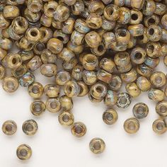 a pile of beads sitting on top of a white table