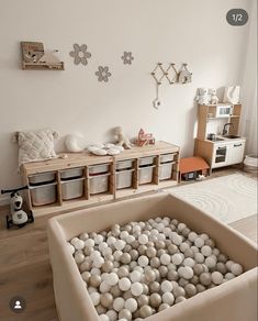 a living room filled with lots of white balls