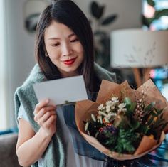 Young woman reading greeting card attached and holding flower bouquet Migraine Hangover, Gift For Therapist, Natural Hand Soap, Migraine Attack, Going Gluten Free, Lavender Spray, Therapist Gifts, Mother's Day Diy, Everything Is Awesome