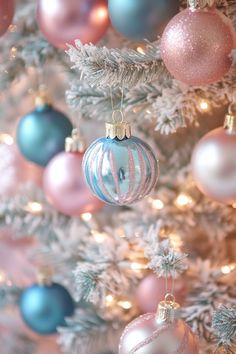 a christmas tree with ornaments hanging from it