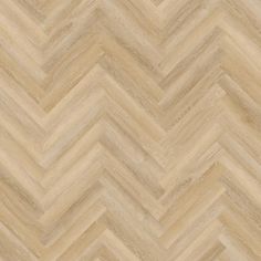 an image of a wood floor with chevrons in beige tones and light brown colors