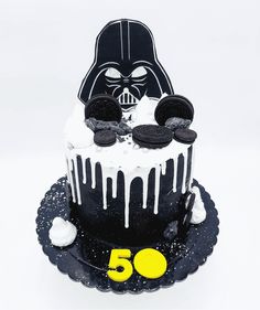 a star wars themed birthday cake with cookies and oreos