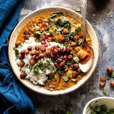 a bowl filled with rice, beans and vegetables