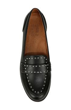 Gleaming stud hardware elevates the trim of this slip-on loafer shaped by a classic moc toe. Synthetic upper/textile lining/synthetic sole Imported Studded Rubber Outsole Platform Loafers For Work, Spring Black Loafers With Studded Rubber Outsoles, Casual Workwear Loafers With Studded Outsoles, Studded Loafers, Black Faux Leather, Loafers For Women, Loafers, Slip On, Faux Leather