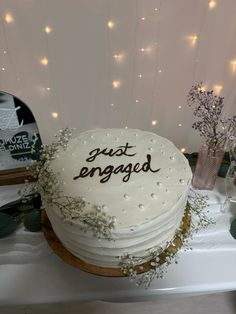 a white cake sitting on top of a table