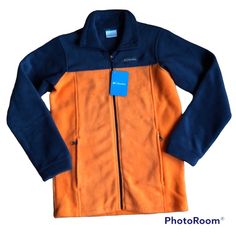 Brand New Never Worn Brand: Columbia Color: Orange Blue Size: Large 14/16, Fits Like Women’s Xs Granite Mountain Ii Fleece Full Zip Fleece Zippered Hand Pockets Patch Logo Comfort Stretch Cuffs Length: 27.5” Pit-Pit/Chest: 18”/36” Shoulder: 15” Sleeve: 23” Measurements Are Approximation, Manufacturer’s Variation Is Possible Any Imperfection Will Be Due To Manufacture’s Workmanship *Color May Look Different Online Vs. Real Life Depend On Screen Setting Make Me An Offer! Bundle Save $ Shipping *Sh Orange Outerwear For Sports In Fall, Blue Fleece Jacket For Fall, Orange Outerwear For Outdoor Activities In Fall, Orange Long Sleeve Sports Outerwear, Blue Fleece Jacket For Hiking In Fall, Purple Rain Coat, Columbia Vest, Columbia Fleece Jacket, Columbia Girls