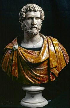 the bust of an ancient man with a beard