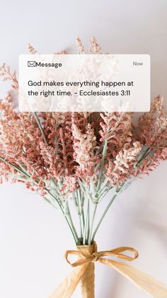 flowers in a vase with the message god makes everything happen at the right time