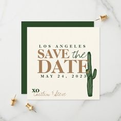 save the date card with a green cactus on it and gold foiled pins in front