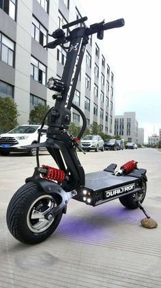 an electric scooter is parked on the street