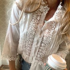 "We are obsessed with this Bohemian Blouse. This pretty blouse features a soft white cotton base, button front, slight mock neck, lace floral details and feminine fit. + Well made + True to size + Heather is 5'8\" tall / 140lbs and modeling a size Medium + Soft Cotton Blend FREE SHIPPING FOR US CUSTOMERS! Ships fast from our studio in Washington State! Approx. Measurements: Small: Pit to pit: 18\", Length: 23\" Medium: Pit to pit: 19\", Length: 23\" Large: Pit to pit: 20\", Length: 24\" XL: Pit Lace Top Patterns, Tribe Design, Bohemian Blouse, Clothing Studio, Romantic Blouses, White Lace Blouse, Bohemian Blouses, Pretty Blouses, Western Boho