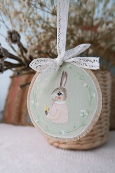 a ceramic ornament with a rabbit on it