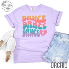 Show your love for all things dance with our stylish and comfortable t-shirt collection on Etsy, featuring unique designs inspired by various dance genres. Great for gifting for recitals, competitions, or any dance function. From graceful ballet to dynamic hip-hop, our premium quality t-shirts are perfect for dancers looking to showcase their passion with flair. **See something you like, but want it customized to fit your vision? Message me SHIRT -Comfort Colors, Garment-Dyed T-Shirt -Unisex Adu Relaxed Fit T-shirt For Dance With Short Sleeves, Casual T-shirt With Letter Print For Dance Class, Casual Graphic Print T-shirt For Dance Class, Casual Graphic Print T-shirt For Dance, Hip Hop T-shirt With Letter Print For Dance Class, Summer Dance Class Crew Neck T-shirt, Hip Hop Letter Print T-shirt For Dance Class, Cotton Relaxed Fit T-shirt For Dance, Relaxed Fit Cotton T-shirt For Dance