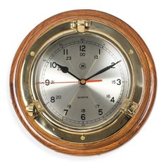 an old fashioned wooden clock on white background