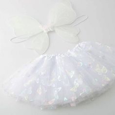 Cute Little Girls Angel Wing Tutu Set Unstretched: 8" Length: 7" White Skirt For Spring Costume Party, Playful White Fitted Skirt, Cute Stretch White Sets, Spring Dress-up Sets In White, White Dress-up Sets For Spring, Fitted White Sets For Dress-up, White Fitted Sets For Dress-up, White Fitted Dress-up Sets, Cute White Dress-up Sets