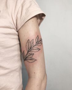 a person with a tattoo on their arm