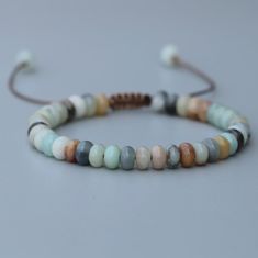 Amazonite Beaded Disc Stacking Bracelet placed onto a grey background Mala Beads Bracelet, Shamballa Bracelets, Amazonite Bracelet, Bracelets Design, Amazonite Stone, Mala Bracelet, A Bracelet, Gemstone Beaded Bracelets, Strand Bracelet