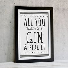 a black and white poster with the words gin and bear it in cursive font