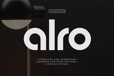 a black and white typeface with the word alro on it's side