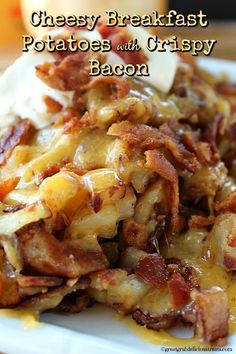 cheesey breakfast potatoes and crispy bacon on a white plate with text overlay