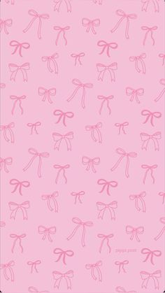 a pink background with bows on it