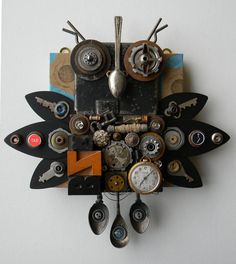 a clock made out of assorted items on a wall