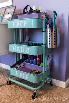 a shelf with some hair products on top of it in front of a purple wall