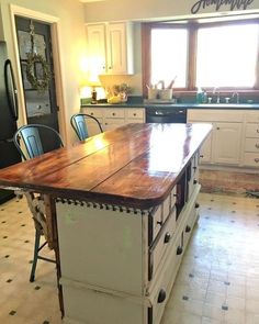 a large kitchen island in the middle of a room