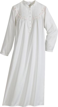 Timelessly romantic, this satin nightgown is a full sweep of beauty and warmth. Satin nightgown flows like silk on the outside and treats you to the softness and warmth of brushed cotton on the inside. In practical terms, you can slip in and out of bed with ease because your sheets and nightgown won't bind up. Beautifully detailed with an embroidered yoke, button cuffs, and a button placket.    Silky satin nightgown has brushed cotton inside   Full coverage with unrestricted ease of movement   E Royal Gowns, White Nightgown, Satin Nightgown, Vermont Country Store, Silk Chemise, Cotton Nightgown, Anne With An E, Muslim Fashion Dress, Cotton Sleepwear