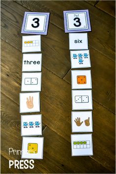 the number three matching game is shown on a wooden floor with hands and fingers in it