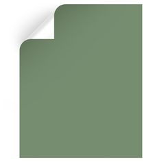 a green sheet of paper with the corner cut out