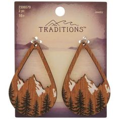 wooden earrings with mountains and trees on them