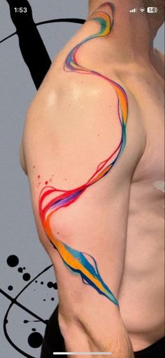 a man with a colorful tattoo on his arm