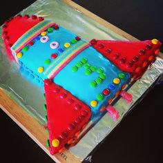 a birthday cake made to look like a rocket ship