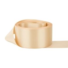 a roll of beige satin ribbon on a white background with an arrow shaped corner in the middle