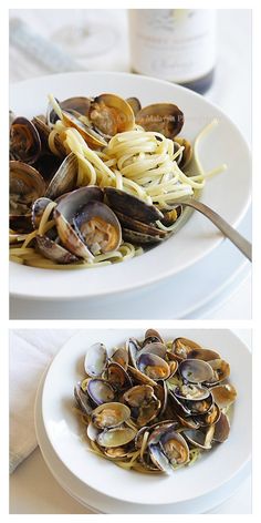 two plates with pasta and clams on them