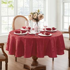 a red table cloth on a dining room table