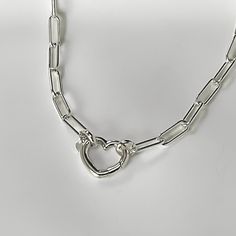 High Quality Solid 925 Italian Sterling Silver Paperclip Necklace, 4.3mm width (links are solid, not hollow and not flat) Solid 925 Sterling Silver Large Open Heart Push Clasp 14mm All material in solid 925 Sterling Silver Lengths:  15" to 36" Shipping: Ready to ship within one business day Free shipping in the USA Comes to you wrapped as shown in the photos The paperclip chain is available in four different sizes, 3mm, 4.3mm, 5mm and 6mm.   Click on the link below to see all the variations: Pap Silver Heart-shaped Cable Chain Necklace, Silver Heart-shaped Paperclip Chain Jewelry, Silver Open Heart Chain Necklace, Silver Paperclip Necklace, Paperclip Necklace, Open Heart Necklace, Silver Heart Necklace, Open Heart, Laguna Beach