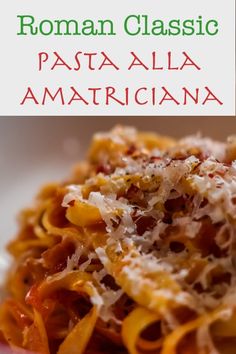 pasta with tomato sauce and parmesan cheese on top