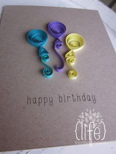 a birthday card with colorful spirals on it