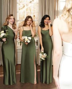 the bridesmaids are all dressed in green dresses