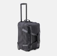 Your weekend travel plans just got a whole lot easier. Designed by a sneakerhead, for a sneakerhead, this weekend travel luggage is ready to go with you on your next adventure. With the sleek black design, collapsible handle, and front-facing laptop pocket, it doesn’t leave much room for an argument besides... “are we driving or flying?” RESHOEVN8R’S luxury design, paired with a traveler's needs in mind, this bag is ready to go. Features: Two wheels for easy, seamless travel Top zipping easy acc Black Sporty Travel Accessories For Outdoor, Black Sporty Outdoor Travel Accessories, Sporty Luggage With Luggage Sleeve For Trips, Sporty Luggage With Sleeve For Trip, Black Waterproof Functional Luggage, Sporty Black Rectangular Travel Accessories, Functional Black Waterproof Luggage, Sporty Travel Bag With Luggage Sleeve For Trips, Functional Travel Bag With Reinforced Handles For Weekend Trips