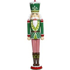 a green and red nutcracker ornament