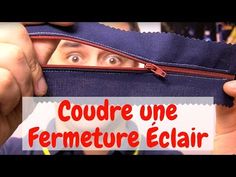 a man holding up a piece of fabric with the words courre une fermeture eclair on it