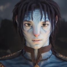 a man with dreadlocks and blue makeup looks at the camera while wearing a star trek uniform