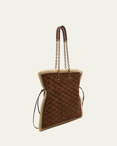 Saint Laurent "Le Pochon" shoulder bag in quilted suede, leather, and natural/dyed lamb shearling (Italy)    Chain shoulder straps     Open top with magnetic and side drawstring closures    Interior, one zip pocket     Approx. 4.9"H x 7.9"W x 2"D    Made in Italy Travel Size Perfume, Loafer Mules, Cleanser And Toner, Open Top, Shoe Sale, Handbags On Sale, Accessories Shop, Belt Bag, Travel Size Products