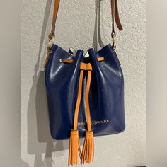 Navy Dooney & Bourke Bucket Bag Never Used! Amazing Condition. Drawstring Closure, Adjustable Strap. So Cute For A Day Out. Blue Crossbody Bucket Bag For Errands, Blue Bucket Bag With Detachable Handle For Errands, Blue Bucket Bag With Removable Pouch For Errands, Navy Bucket Bag For Daily Use, Blue Satchel Bucket Bag With Dust Bag, Blue Travel Bucket Bag With Gold-tone Hardware, Chic Blue Bucket Bag With Gold-tone Hardware, Blue Bucket Bag For On-the-go, Blue Bucket Shoulder Bag With Gold-tone Hardware