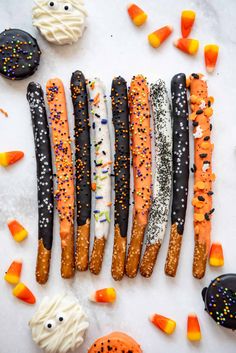 halloween pretzels with sprinkles, candy and candies on the side